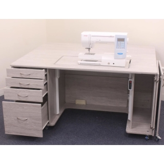 Here the Tasman cabinet is set to use the sewing machines sleave arm