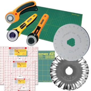 Rotary fabric cutters, mats and patchwork rule